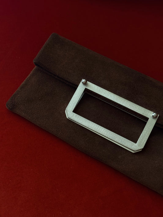 Pochette vintage in suede con manico in metallo