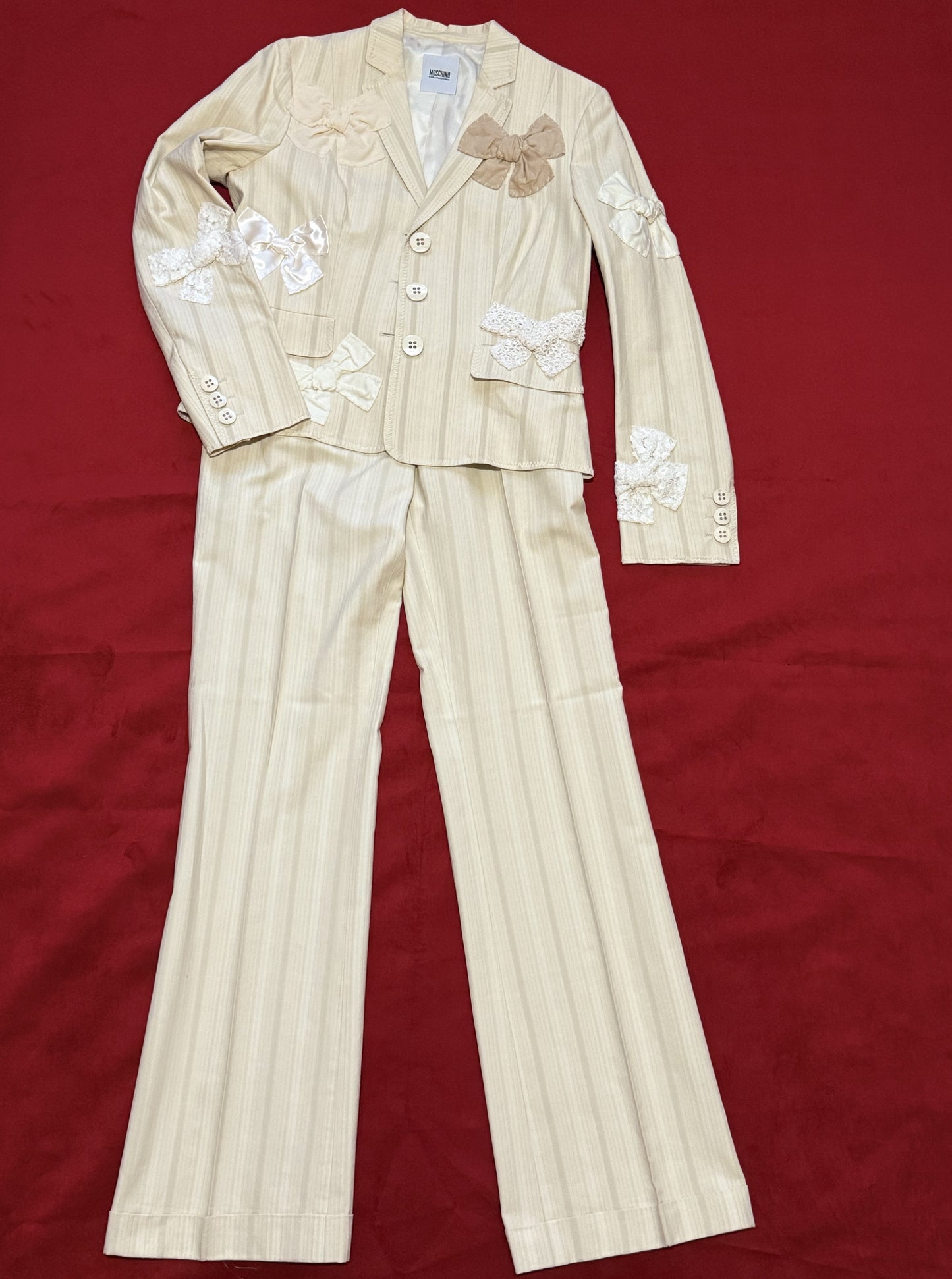 Moschino suit with bows