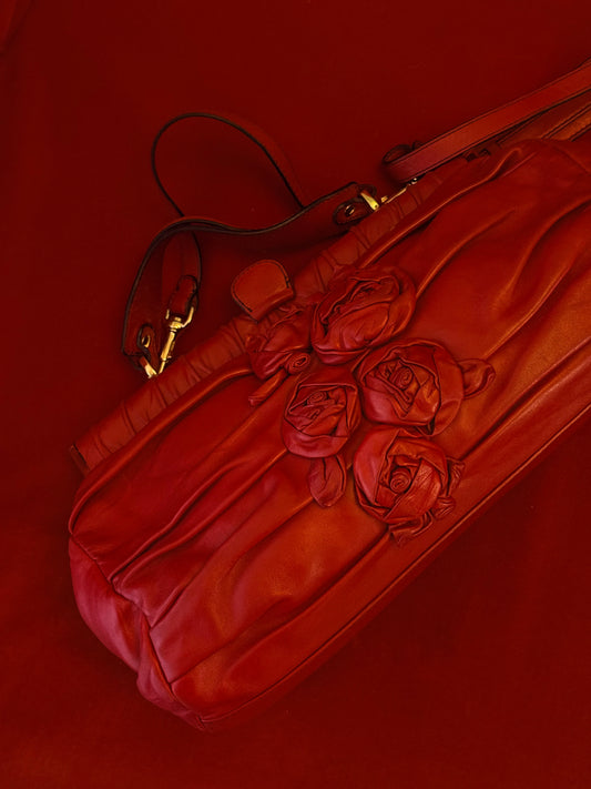 Valentino maxi clutch con rose